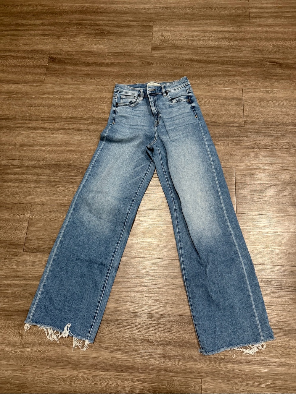 High-Rise Light Blue Wide-Leg Jeans with Frayed Hem